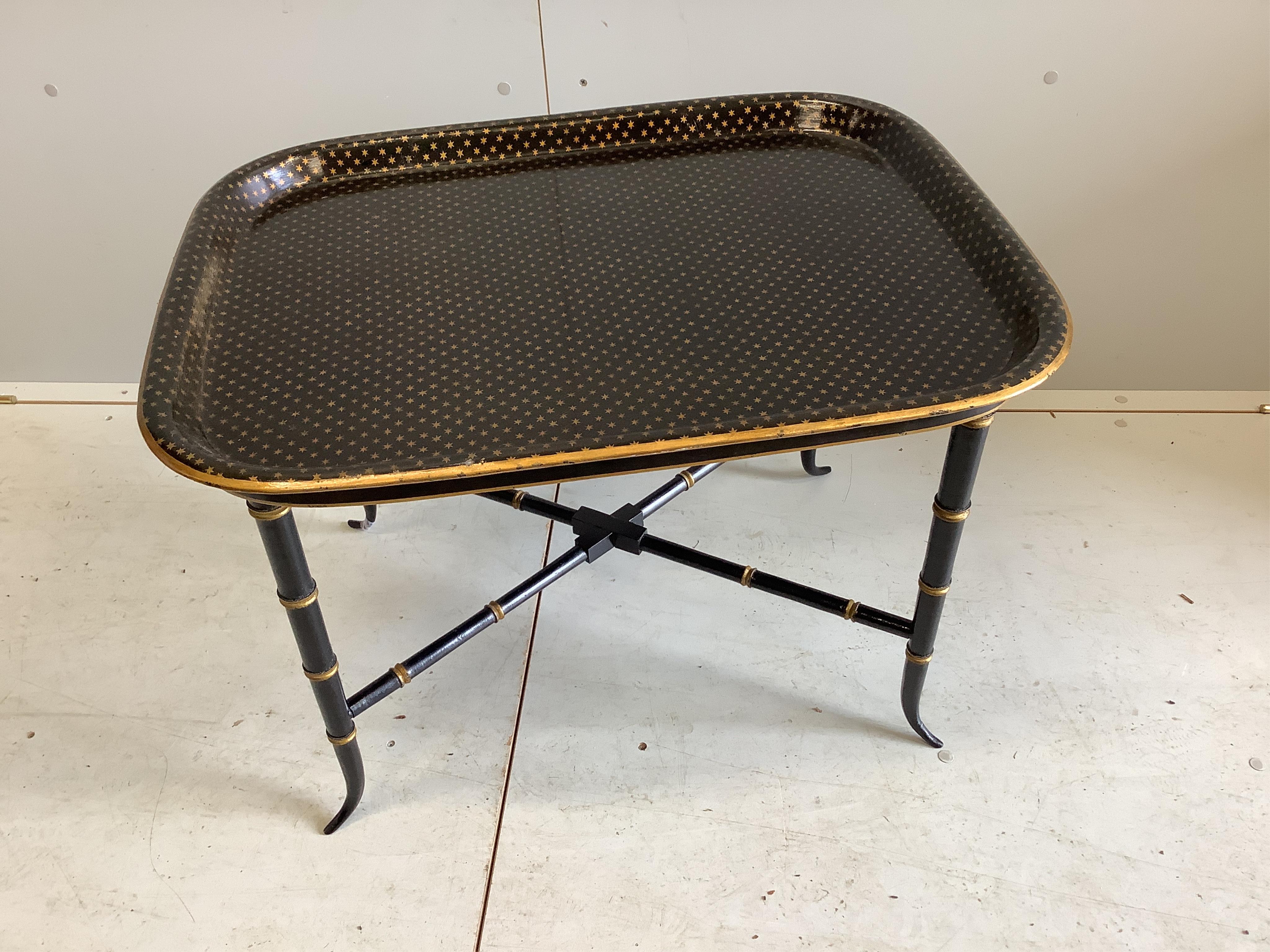 A Regency style toleware tray top occasional table on faux bamboo stand, width 73cm, depth 59cm, height 50cm. Condition - good